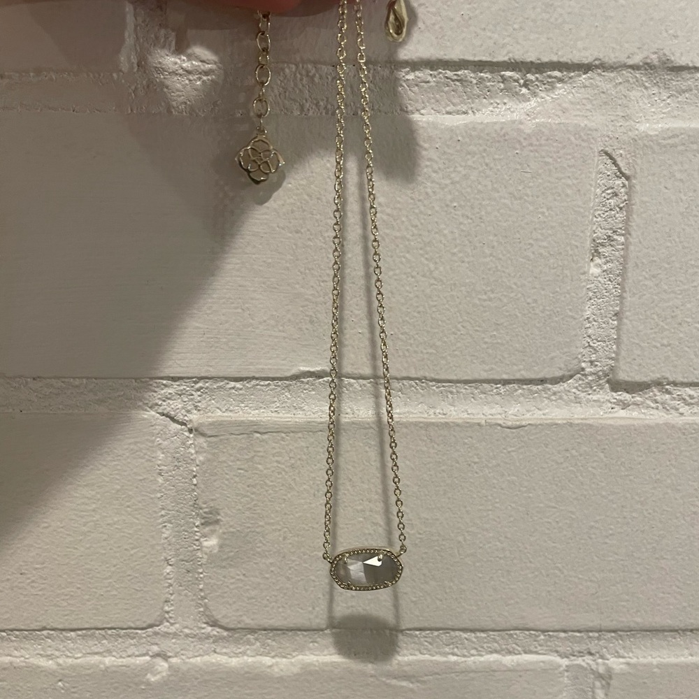 Kendra Scott necklace.